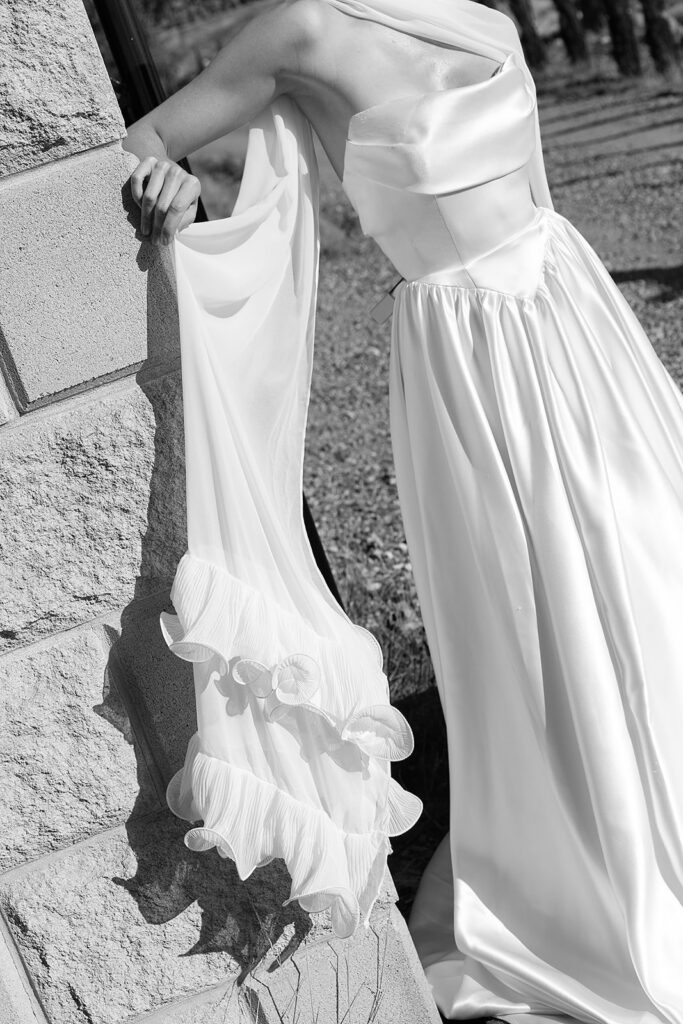 black and white editorial portrait of aston bridal gown