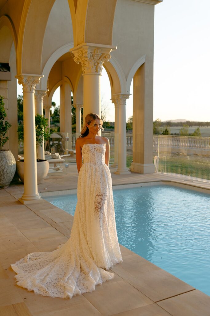golden hour bridal portrait next to pool at alora macedon