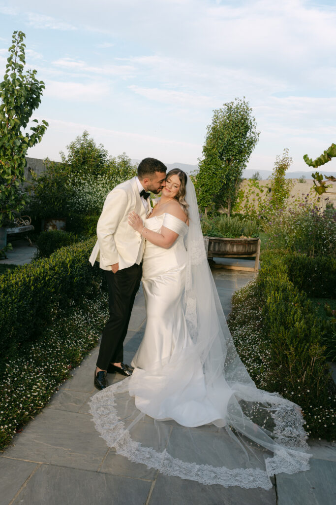 couple embracing after wedding ceremony at stones of the yarra valley