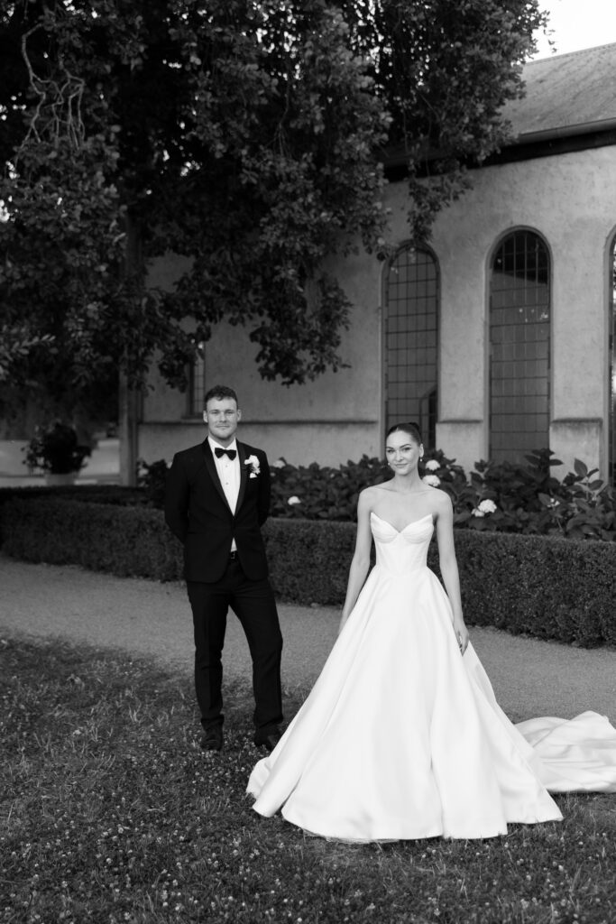black and white editorial portrait of just married couple at stones of the yarra valley