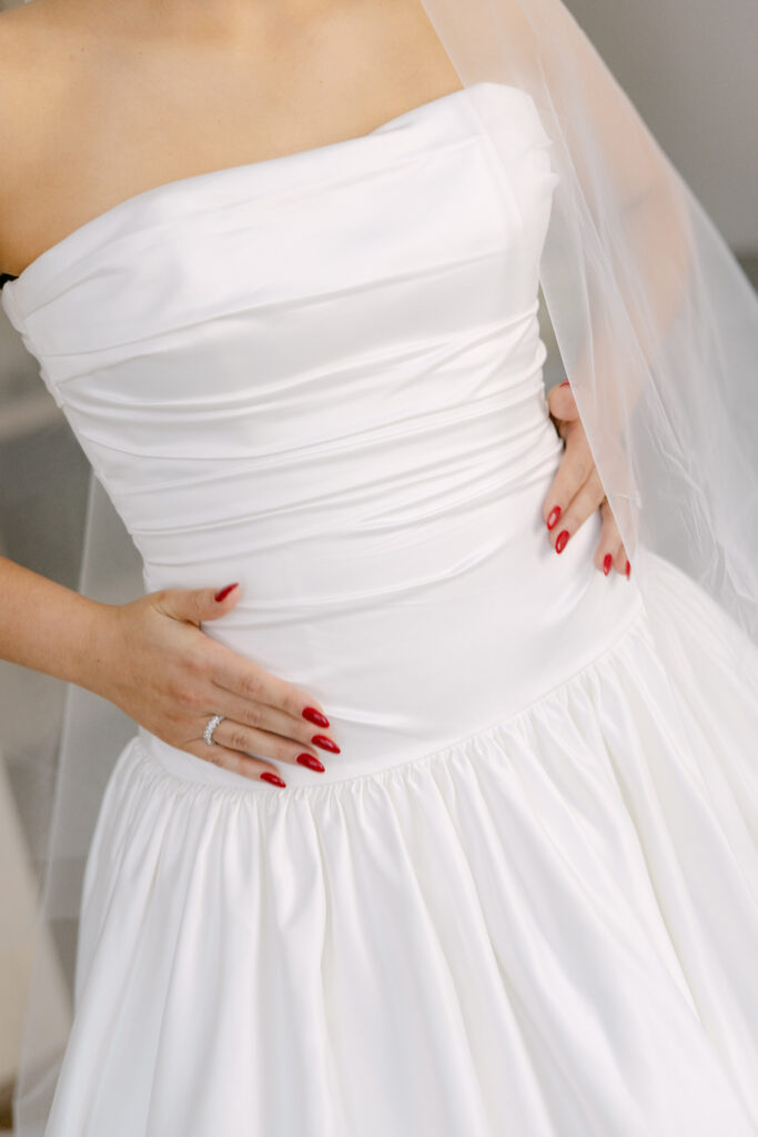 close up kyha studios lucky wedding dress with drop waist bodice, shot by ashleigh haase photography