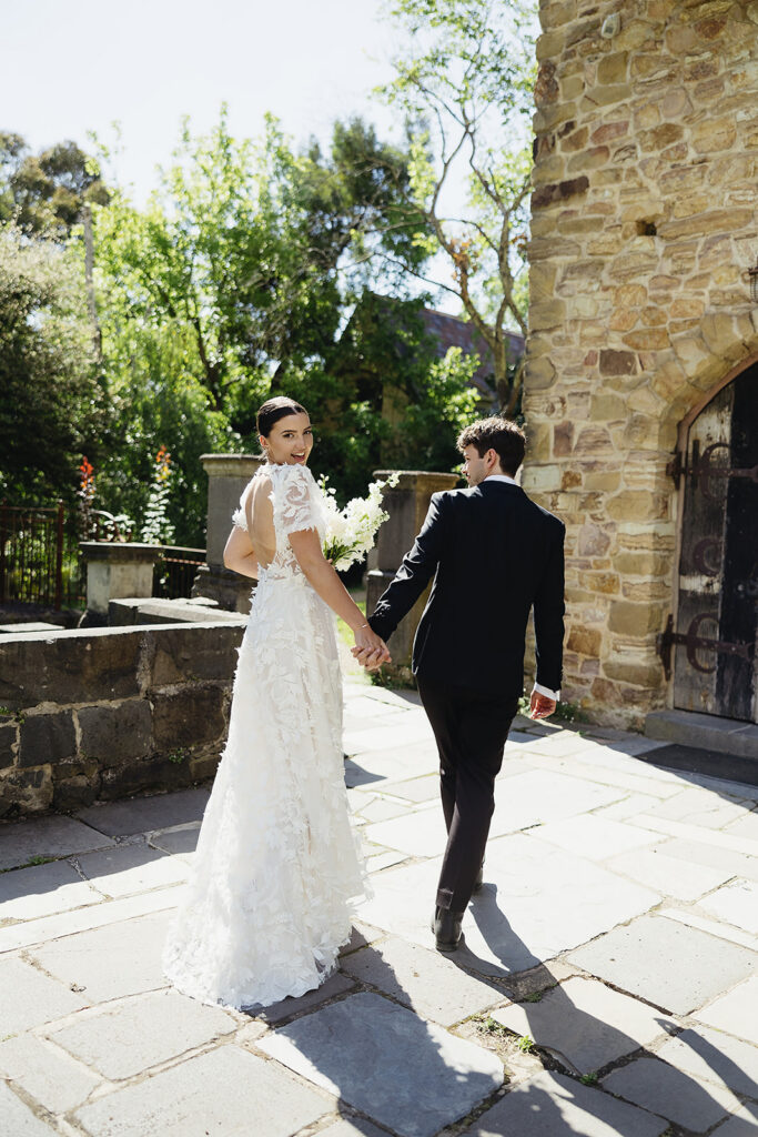 happy couple after wedding ceremony at Montsalvat venue in melbourne