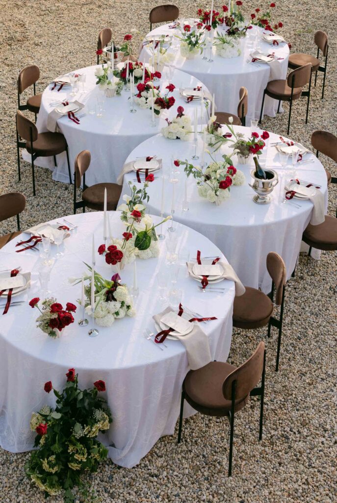 outdoor reception setup at Feathertop Winery with snaking round tables and statement brown chairs