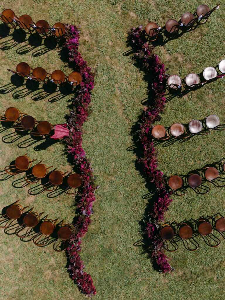 drone portrait of modern garden wedding ceremony setup at Feathertop Winery